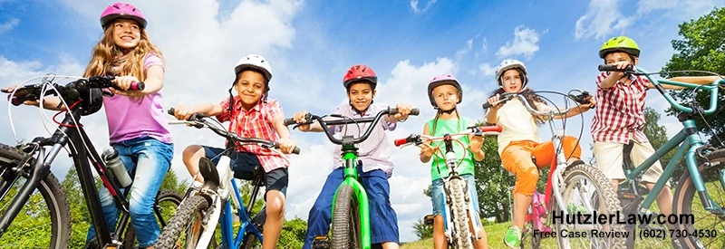hutzler-law-kids-riding-bicycles